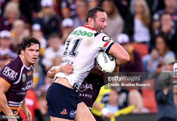 Boyd Cordner of the Roosters takes on the defence during the round 11 NRL match between the Brisbane Broncos and the Sydney Roosters at Suncorp...