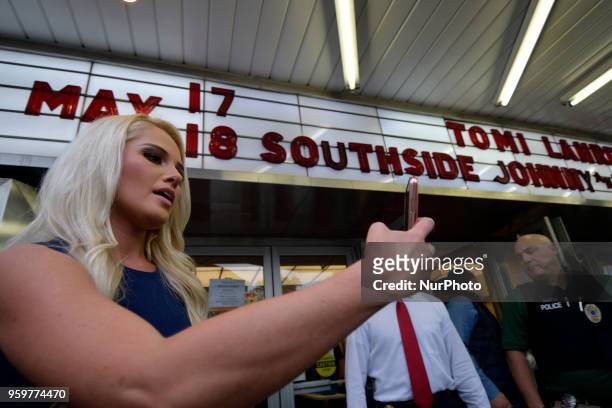 Tomi Lahren, conservative political commentator and Fox News contributor greets fans waiting in line outside the Keswick theatre in Glenside, PA on...