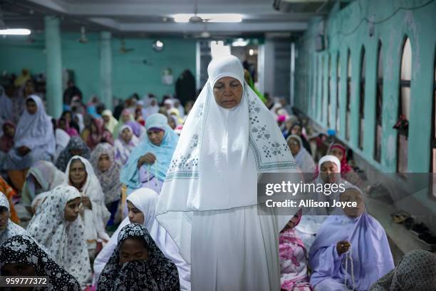 Woman prays on the first day of Ramadan on May 18, 2018 in Dhaka, Bangladesh. Bangladeshis began observing Ramadan on Friday as millions of Muslims...