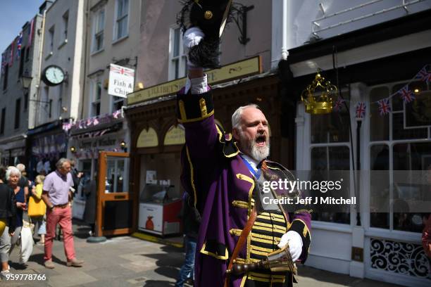 Town crier on the streets near Windsor castle ahead of the royal wedding of Prince Harry and Meghan Markle on May 18, 2018 in Windsor, England.