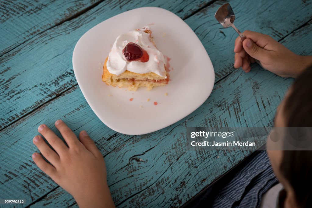 Child with cake