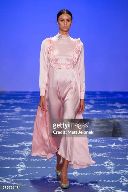 Model walks the runway during the Leo & Lin show at Mercedes-Benz Fashion Week Resort 19 Collections at Carriageworks on May 17, 2018 in Sydney,...