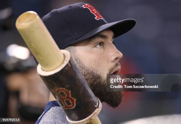 Blake Swihart of the Boston Red Sox looks on as he warms up during batting practice before the start of MLB game action against the Toronto Blue Jays...