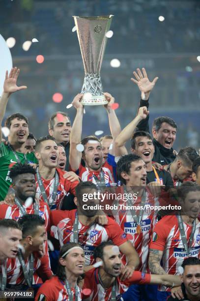 Gabi and the Atletico Madrid team celebrate with the trophy after the UEFA Europa League Final between Olympique de Marseille and Club Atletico de...