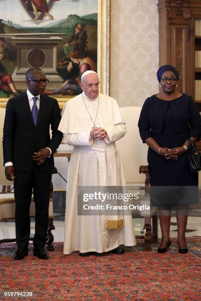 Pope Francis meets the President of Benin Patrice Talon and his wife Claudine Talon during an audience at the Apostolic Palace on May 18, 2018 in...