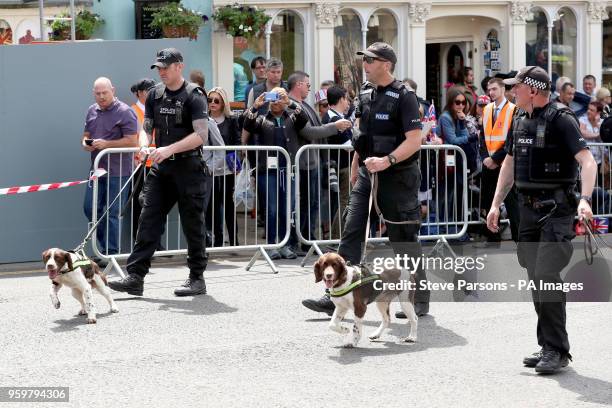 Police with dogs in Windsor ahead of the wedding of Prince Harry and Meghan Markle on Saturday.