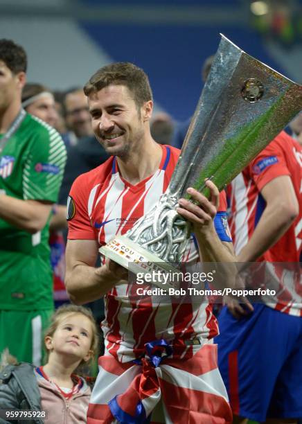 Gabi of Atletico Madrid celebrates with the trophy after the UEFA Europa League Final between Olympique de Marseille and Club Atletico de Madrid at...