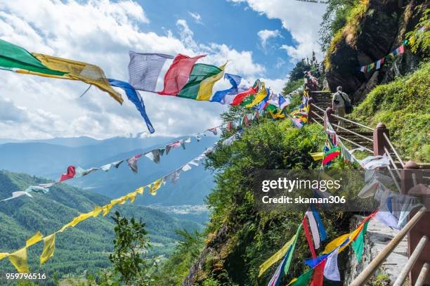 landscape of taktsang monastery  incredible temple located on the cliff near paro city - bhutan stock pictures, royalty-free photos & images