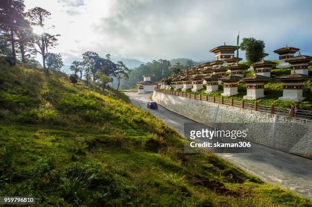 beautiful landscape of dochula 108 stupa at dochula pass bhutan - dochula pass stock pictures, royalty-free photos & images