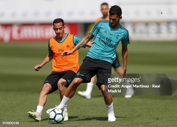 Dani Ceballos; and Lucas Vazquez of Real Madrid in action during a training session at Valdebebas training ground on May 18, 2018 in Madrid, Spain.