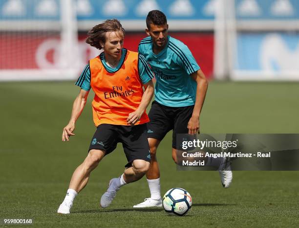 Luka Modric and Dani Ceballos of Real Madrid in action during a training session at Valdebebas training ground on May 18, 2018 in Madrid, Spain.