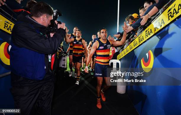 Eddie Betts of the Adelaide Crows leads his team down the race during the round nine AFL match between the Adelaide Crows and the Western Bulldogs at...