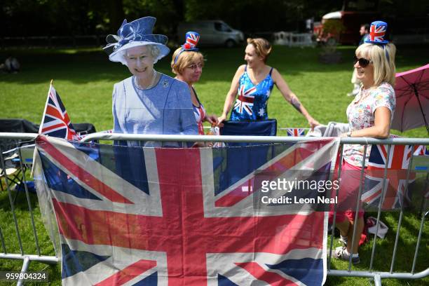Cardboard cut-out of Britain's Queen Elizabeth II is seen as royal fans settle into their positions on the Long Walk, near Windsor Castle, a day...