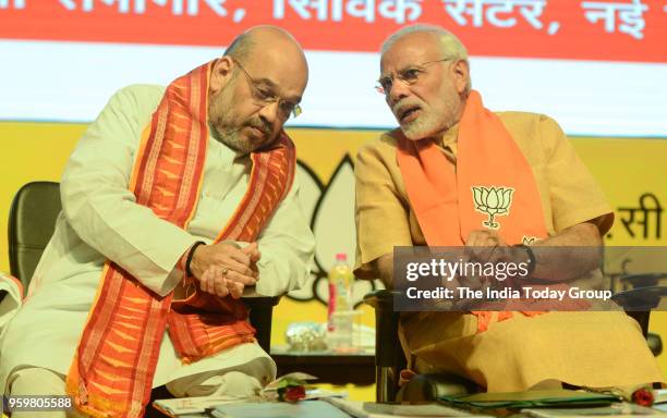 Prime Minister Narendra Modi and BJP National President Amit Shah at the concluding session of the National Executive Committee meeting at Civic...