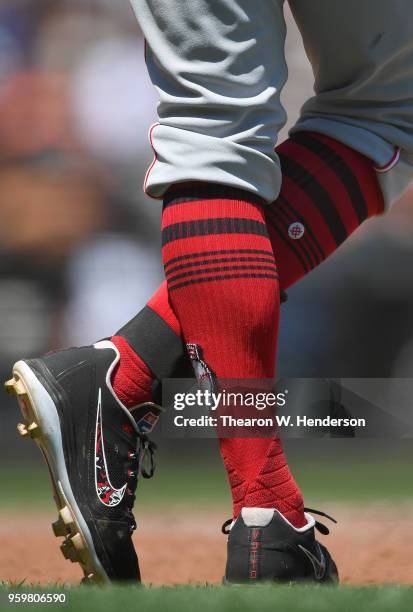 Detailed view of the Nike baseball cleats worn by Joey Votto of the Cincinnati Reds against the San Francisco Giants in the top of the fifth inning...