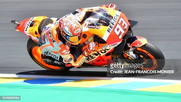 Repsol Honda Team's Spanish rider Marc Marquez rides during a MotoGP free practice session, ahead of the French Motorcycle Grand Prix, on May 18 in...