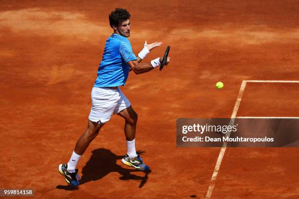 Pablo Carreno Busta of Spain returns a forehand in his quarter final match against Marin Cilic of Croatia during day 6 of the Internazionali BNL...