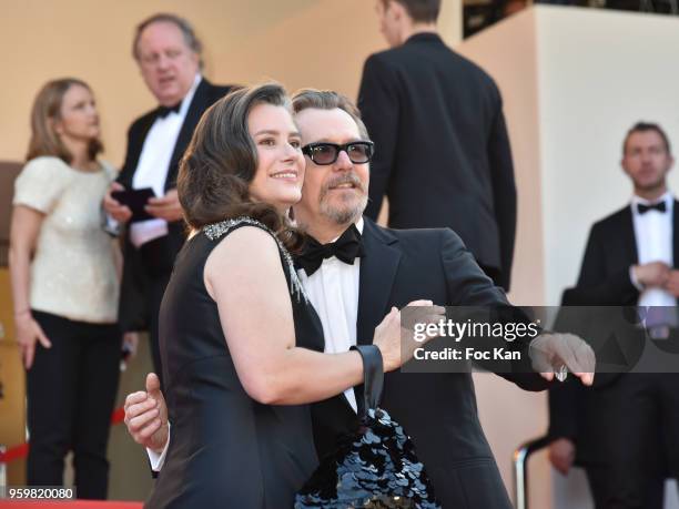 Gary Oldman and Gisele Schmidt attend the screening of 'Capharnaum' during the 71st annual Cannes Film Festival at Palais des Festivals on May 17,...
