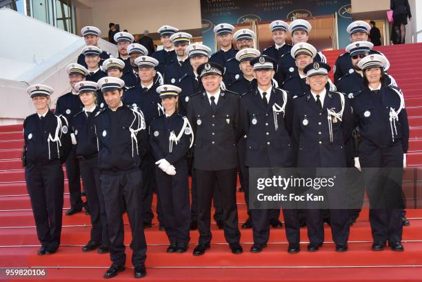 Policer officers pose for the annual photo of Cannes festival Festival attend the screening of'Capharnaum' during the 71st annual Cannes Film...