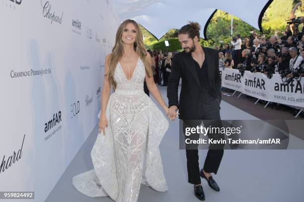 Heidi Klum and Tom Kaulitz arrive at the amfAR Gala Cannes 2018 at Hotel du Cap-Eden-Roc on May 17, 2018 in Cap d'Antibes, France.