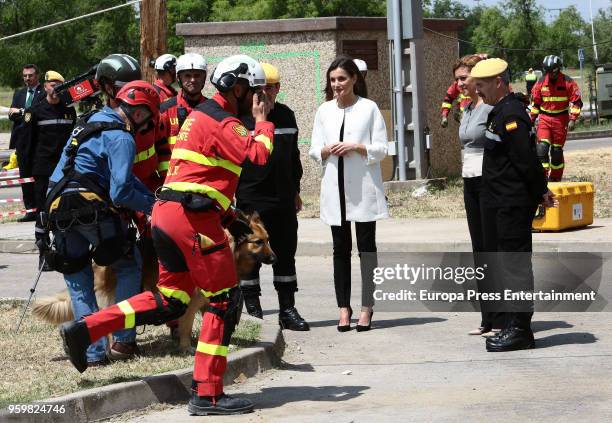 Queen Letizia of Spain and Dolores de Cospedal attend Military Emergency Unit headquarters on May 18, 2018 in Torrejon De Ardoz, Spain.
