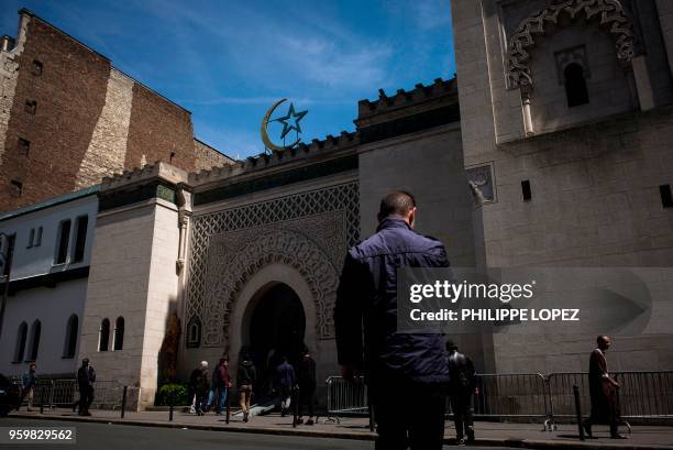 Muslims arrive at the Grande Mosquee de Paris in Paris on May 18, 2018 for the first Friday prayers of the holy month of Ramadan.