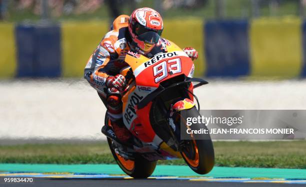 Repsol Honda Team's Spanish rider Marc Marquez rides during a MotoGP free practice session, ahead of the French Motorcycle Grand Prix, on May 18,...