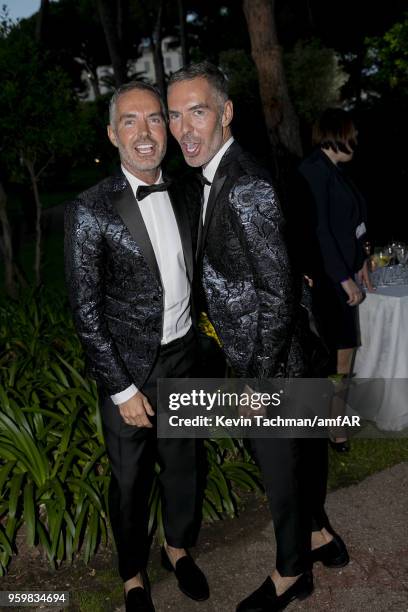 Dean and Dan Caten attend the cocktail at the amfAR Gala Cannes 2018 at Hotel du Cap-Eden-Roc on May 17, 2018 in Cap d'Antibes, France.