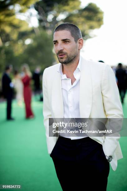 Carl Hirschmann attends the cocktail at the amfAR Gala Cannes 2018 at Hotel du Cap-Eden-Roc on May 17, 2018 in Cap d'Antibes, France.