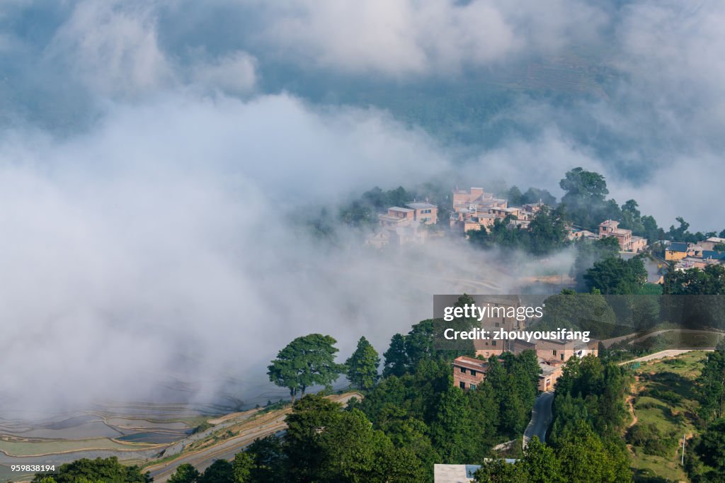 The cloud sea and the terraced fields and village