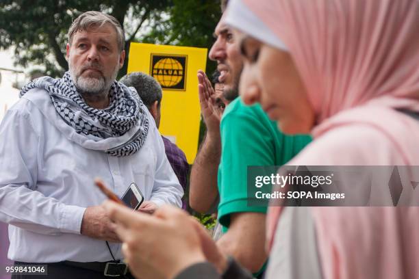 Foreign man seen at Kuala Lumpur to show their support against the Israel cruelty. Even it is the holy Ramadhan, hundreds of Muslim in Malaysia...