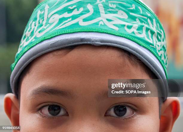 Children seen gathering to show his support against the Israel cruelty. Even it is the holy Ramadhan, hundreds of Muslim in Malaysia marched in front...