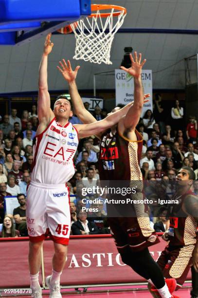 Dairis Bertans of EA7 competes with Mitchell Watt and Edgar Sosa of Umana during the LBA LegaBasket match between Reyer Umana Venezia and Olimpia EA7...