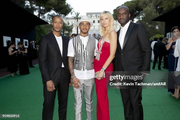 Guest, Lewis Hamilton, Karolina Kurkova and Virgil Abloh attend the cocktail at the amfAR Gala Cannes 2018 at Hotel du Cap-Eden-Roc on May 17, 2018...
