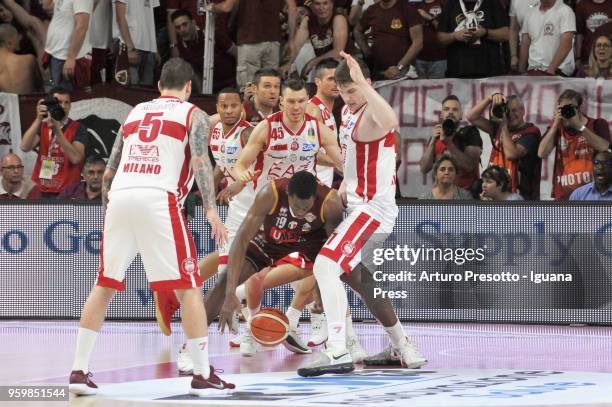 Paul Stephan Biligha of Umana competes with Vladimir Micov - Curtis Jerrells - Dairis Bertans - Andrea Cinciarini - Arturas Gudaitis of EA7 during...