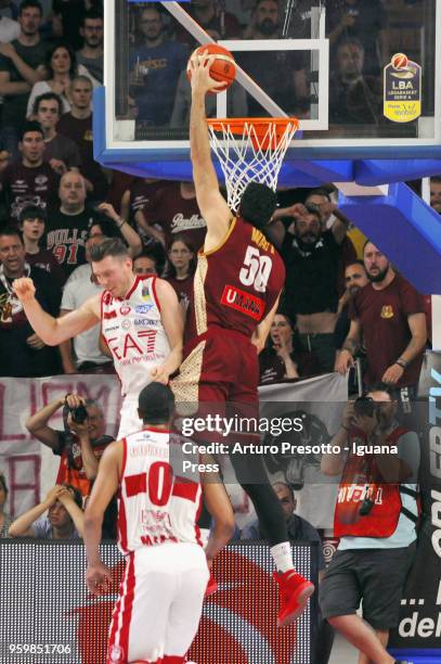 Mitchell Watt of Umana competes with Dairis Bertans and Andrew Goudelock of EA7 during the LBA LegaBasket match between Reyer Umana Venezia and...