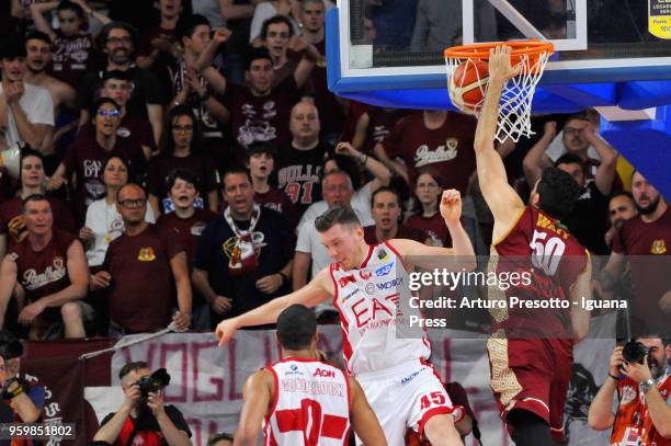 Mitchell Watt of Umana competes with Dairis Bertans and Andrew Goudelock of EA7 during the LBA LegaBasket match between Reyer Umana Venezia and...