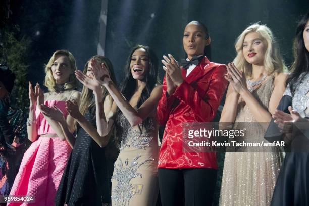 Daria Strokus, Winnie Harlow, Lais Ribeiro and Elsa Hosk on stage at the amfAR Gala Cannes 2018 at Hotel du Cap-Eden-Roc on May 17, 2018 in Cap...