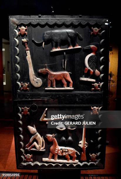 Door of the palace of King Glegle of the Kingdom of Dahomey dating back to 1880-1889 is pictured, on May 18, 2018 at the Quai Branly Museum-Jacques...