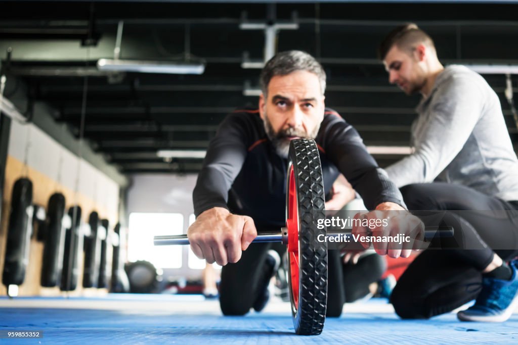 People exercising at gym