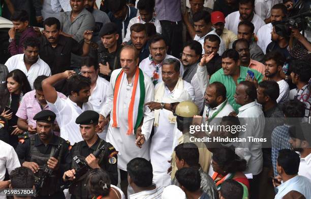 Senior Congress leader and the leader of the opposition Rajya Sabha Ghulam Nabi Azad and the outgoing Chief Minister of Karnataka, Siddaramaiah march...