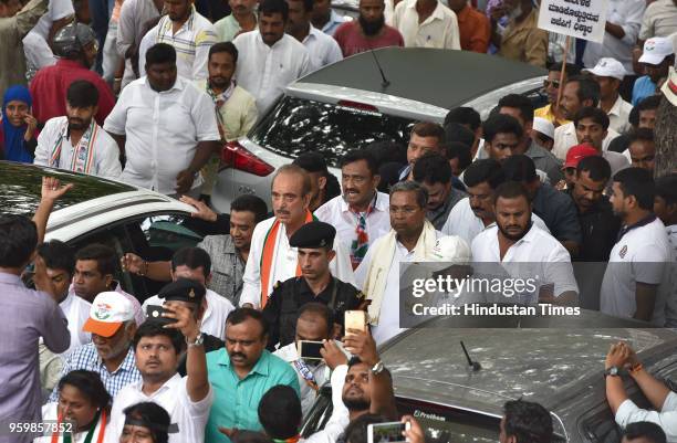 Senior Congress leader and the leader of the opposition Rajya Sabha Ghulam Nabi Azad and the outgoing Chief Minister of Karnataka, Siddaramaiah march...