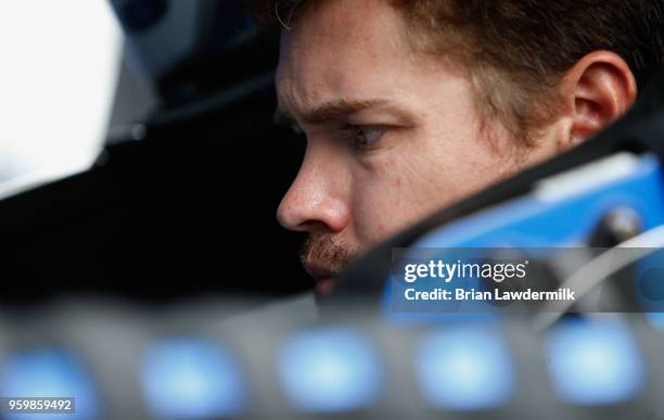 Ricky Stenhouse Jr., driver of the Fastenal Ford, sits in his car during practice for the Monster Energy NASCAR Cup Series All-Star Race at Charlotte...