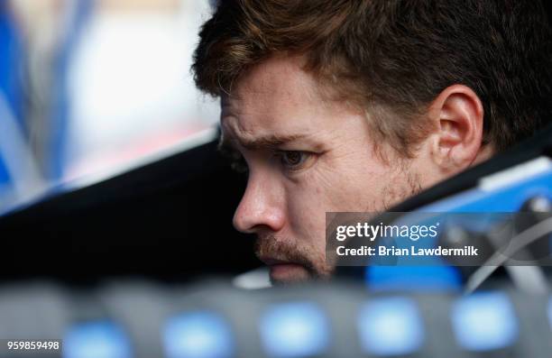 Ricky Stenhouse Jr., driver of the Fastenal Ford, sits in his car during practice for the Monster Energy NASCAR Cup Series All-Star Race at Charlotte...