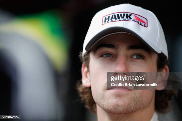 Ryan Blaney, driver of the Hawk/Carlisle Ford stands in the garage area during practice for the Monster Energy NASCAR Cup Series All-Star Race at...