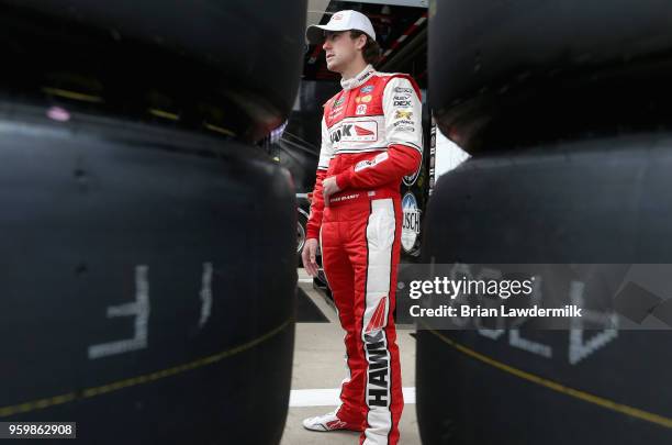 Ryan Blaney, driver of the Hawk/Carlisle Ford stands in the garage area during practice for the Monster Energy NASCAR Cup Series All-Star Race at...