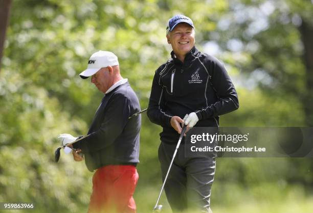 Mark Ridley of South Moor Golf Club smiles after his shot during the Silversea Senior PGA Professional Championship at Foxhills Golf Course on May...