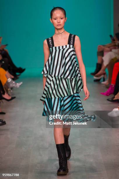 Model walks the runway during the Akira show at Mercedes-Benz Fashion Week Resort 19 Collections at Carriageworks on May 17, 2018 in Sydney,...