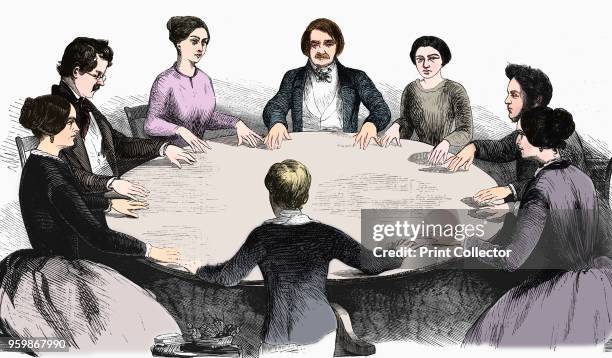 Spiritualist meeting in Leipzig, Germany, 1893. Communicating with spirits by table-turning. From L'Illustration. . . Artist Unknown.