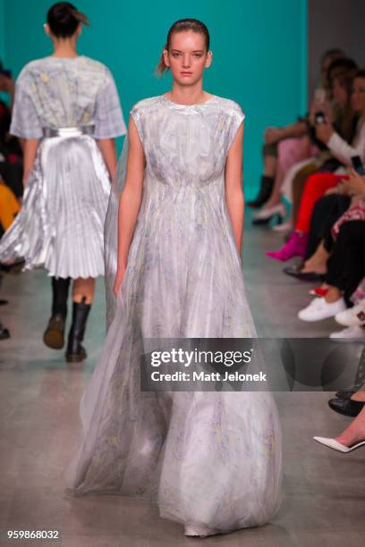 Model walks the runway during the Akira show at Mercedes-Benz Fashion Week Resort 19 Collections at Carriageworks on May 17, 2018 in Sydney,...